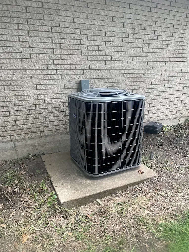 Outdoor central air conditioning unit serviced by Tito's Heating and Air